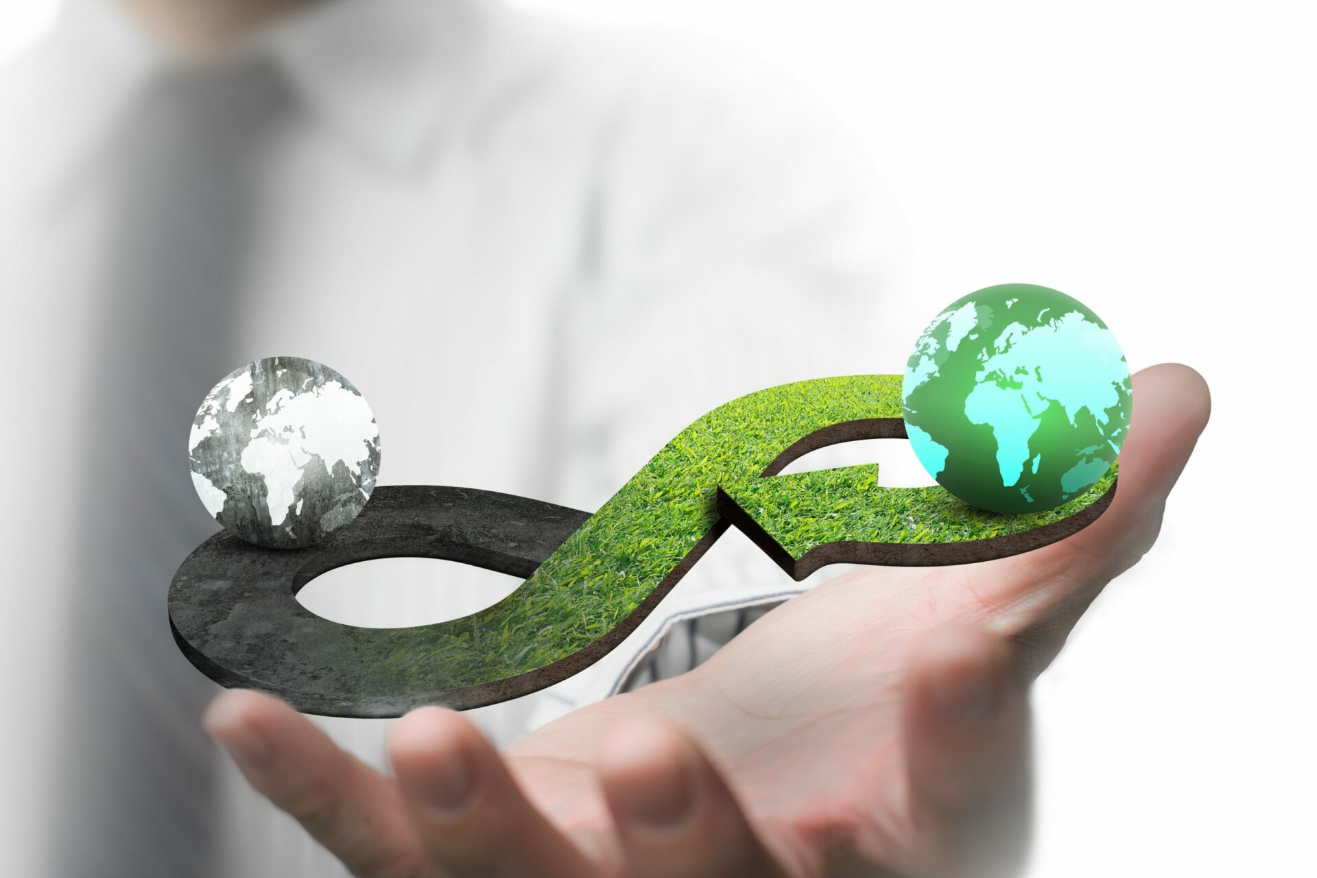 Green,Circular,Economy,Concept.,Man’s,Hand,Showing,Arrow,Infinity,Symbol