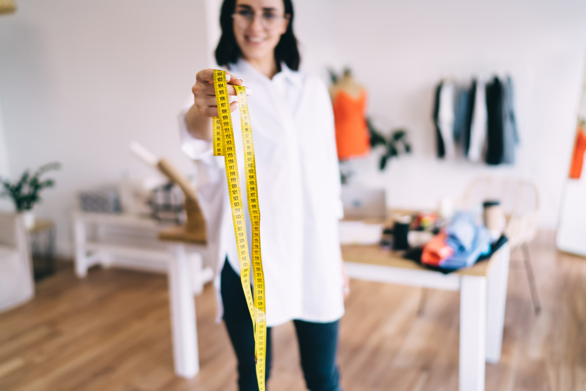tailor with a measuring tape