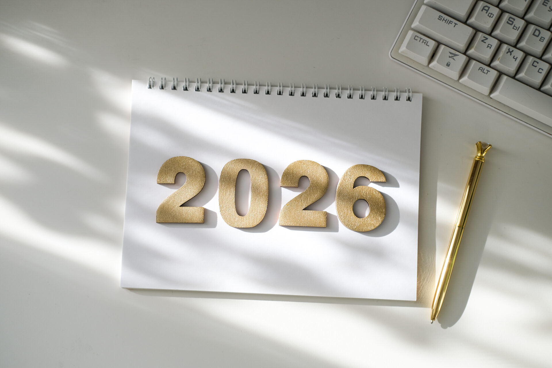 2026 on a pad next to a computer
