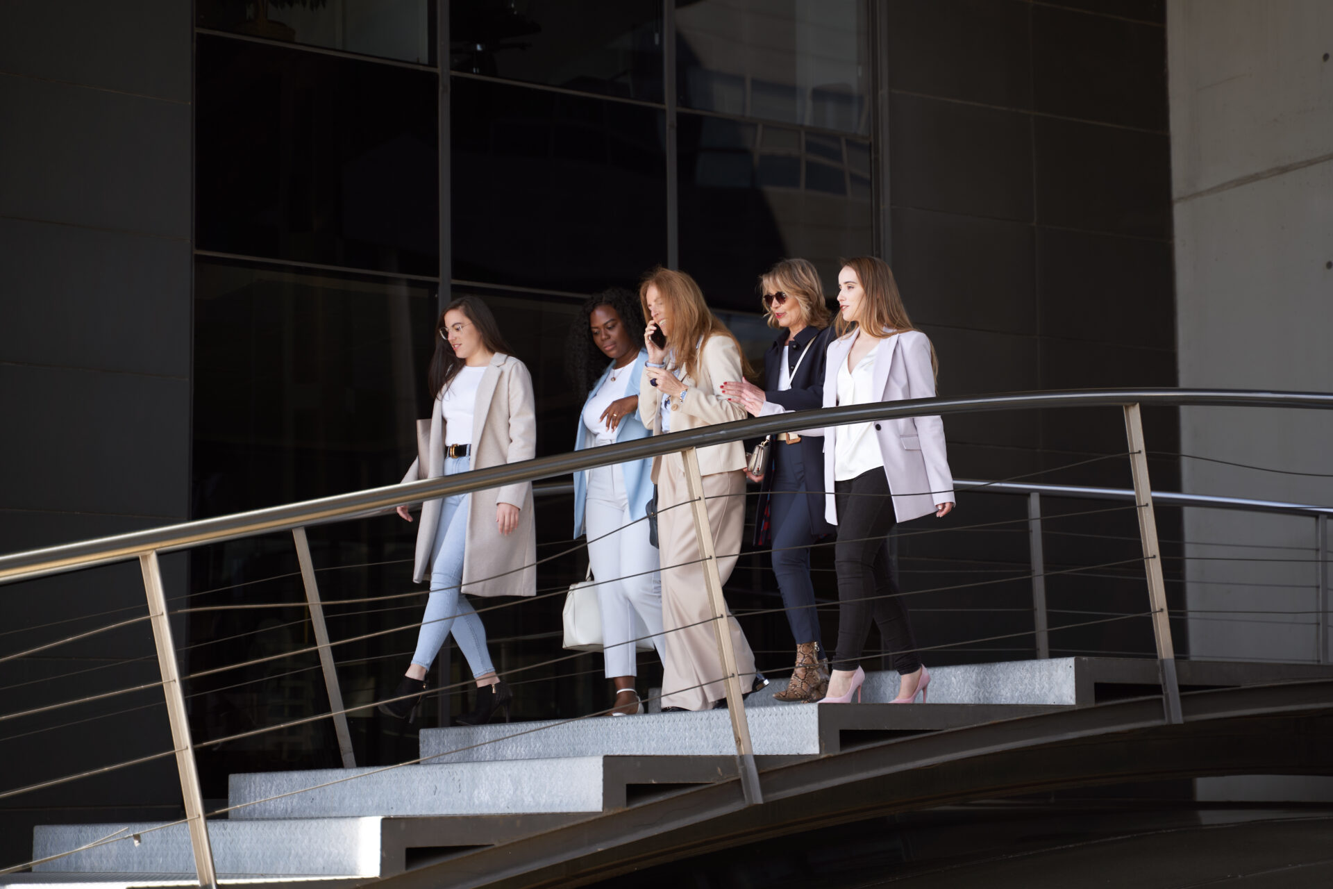 longevity vs fashion - women walking down steps