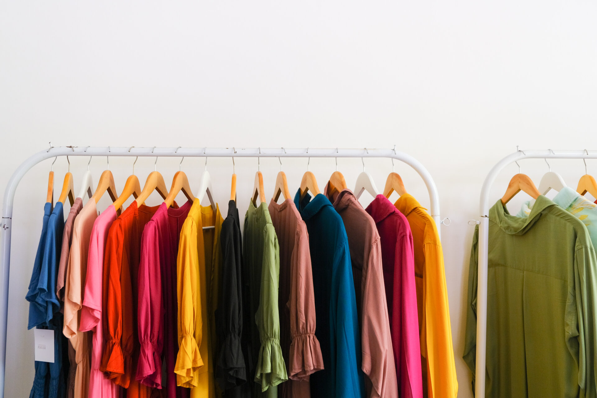 clothes hanging on rail