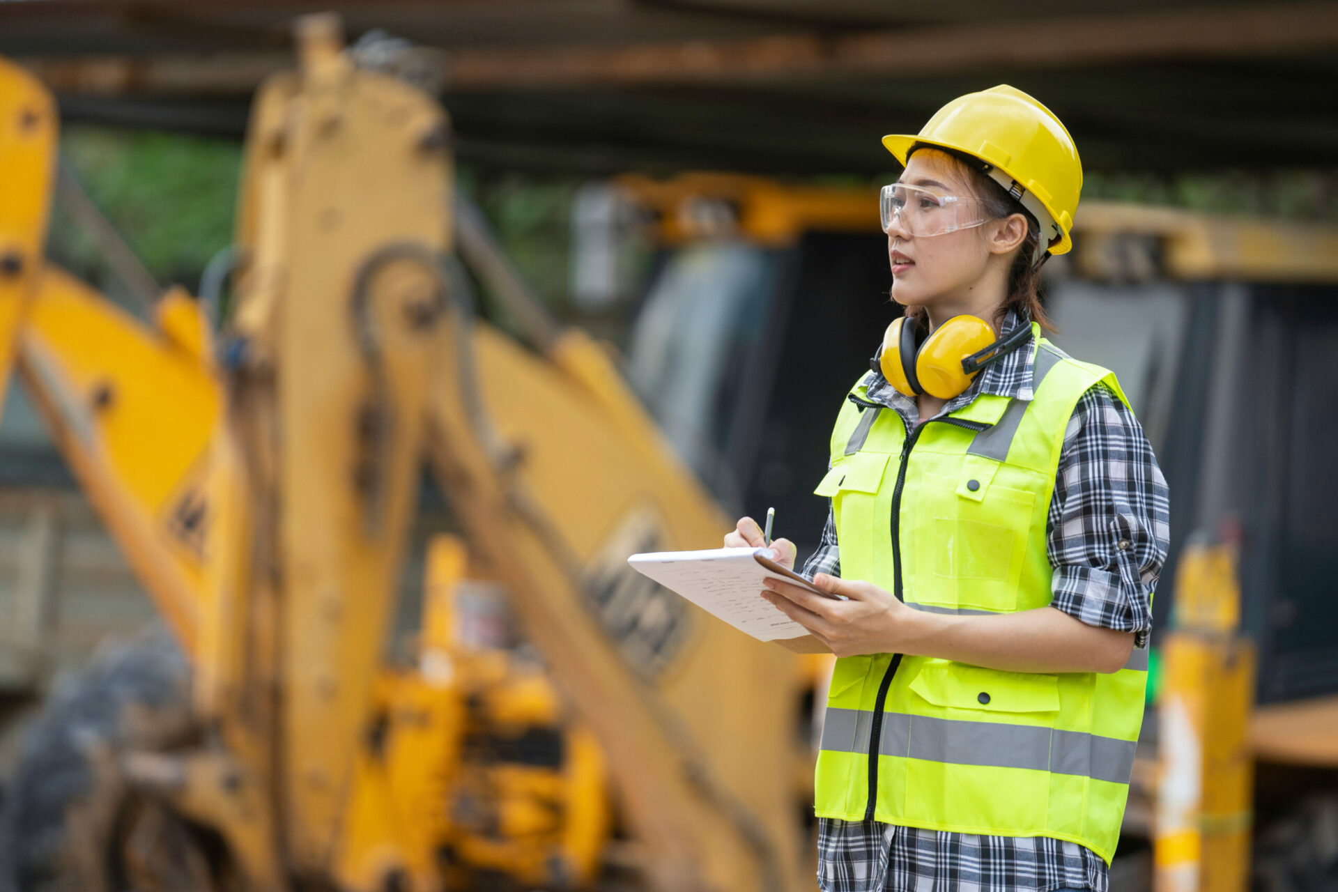 A,Asian,Girl,Construction,Engineer,At,Construction,Site, Uniform