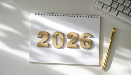 2026 on a pad next to a computer