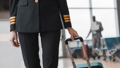 female pilot walking
