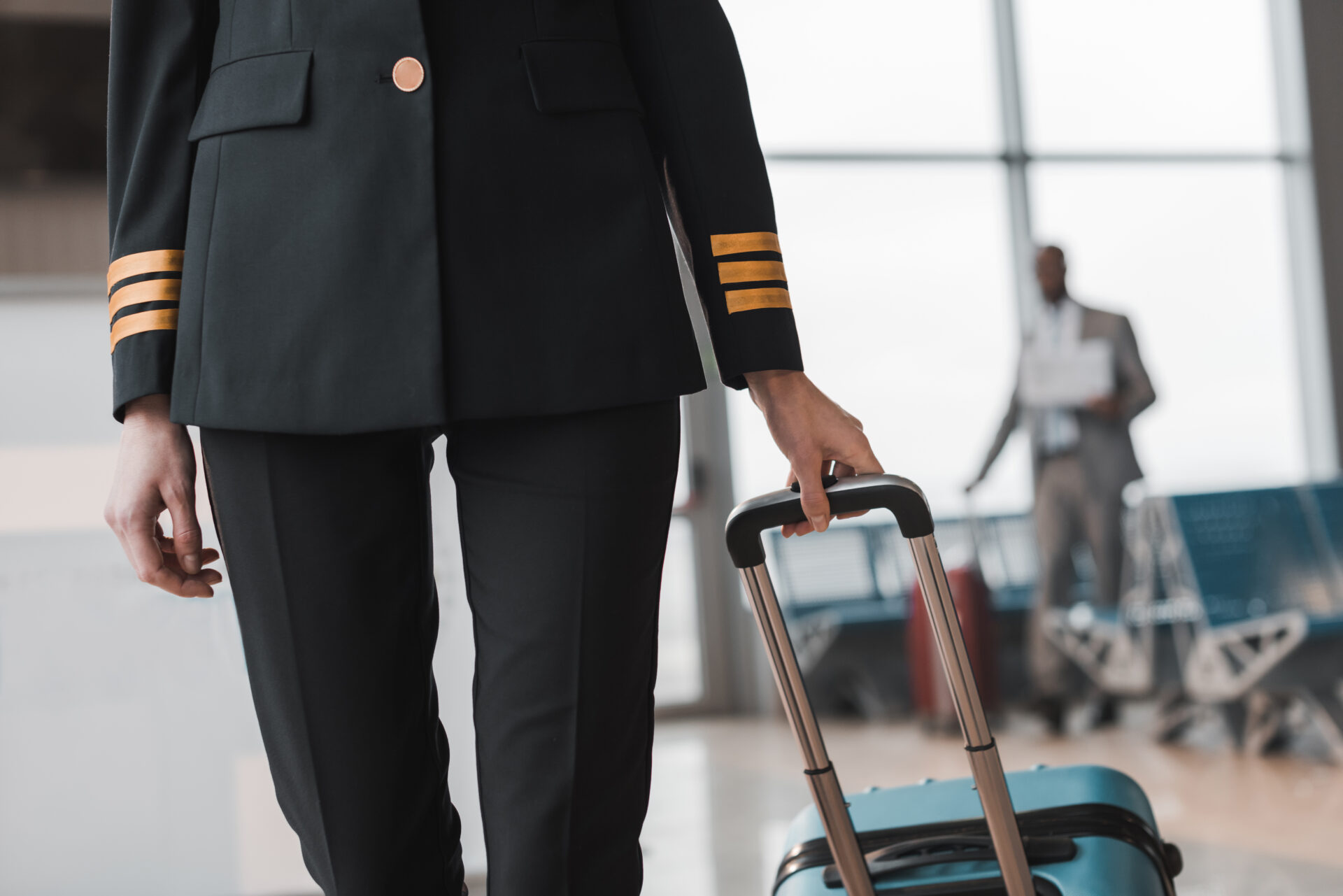 female pilot walking